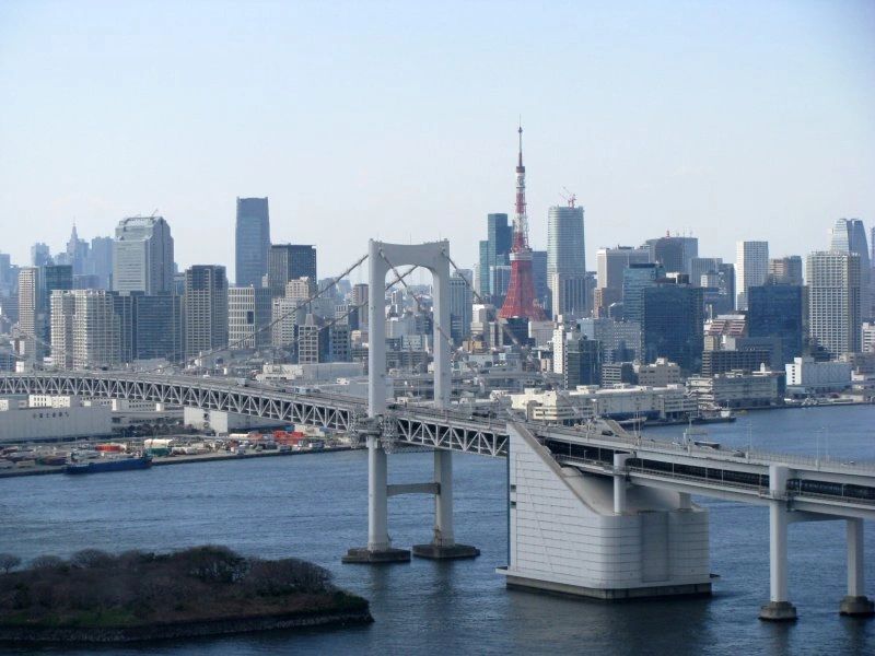 Tokyo skyline and Rainbow Bridge across Tokyo Bay